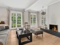 Eleganter Wohnbereich nach Süden mit Kamin