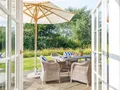 Südterrasse mit Aussicht in den großen Heidegarten
