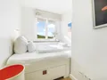 Einzelschlafzimmer mit Dünenblick