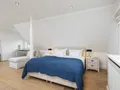 Großzügiges Schlafzimmer mit Bad en suite