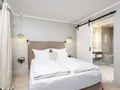Doppelschlafzimmer mit Bad en suite im Souterrain